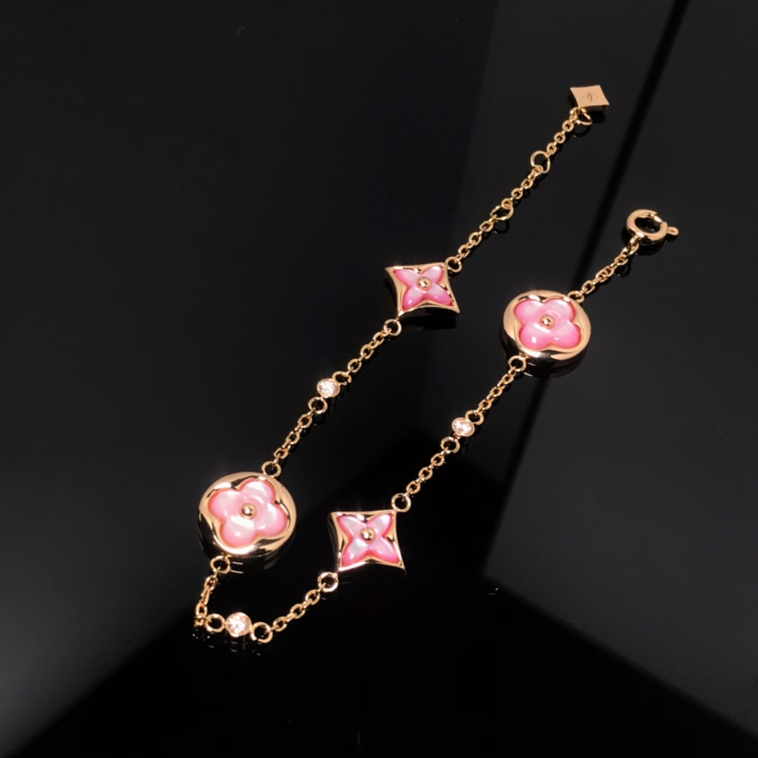 STAR AND SUN 4 MOTIF PINK MOP PINK GOLD BRACELET