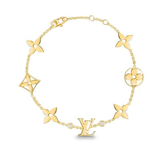 STAR AND SUN 7 MOTIFS GOLD BRACELET